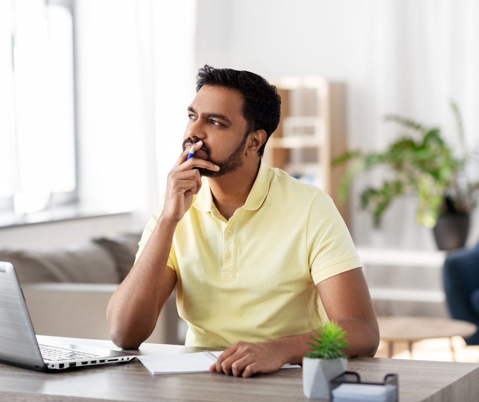 man pondering illustrating the idea to get started writing your book