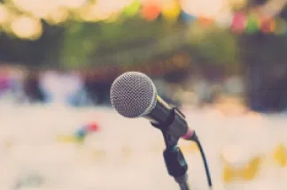 microphone illustrating the idea of how to build your author platform with speaking engagements