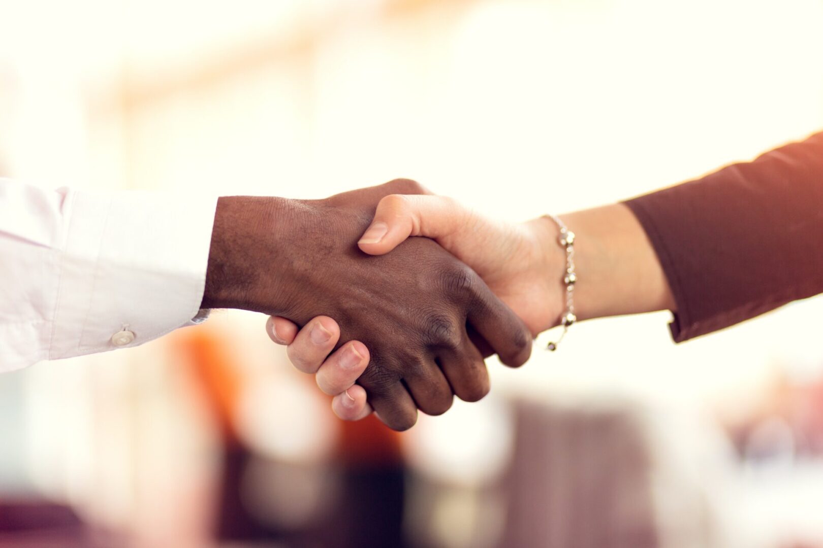 handshake illustrating idea of how to find a literary agent who will make a good partner for you